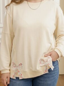Plus Size Raw Seam Detail Floral Bow Oversized Pullover 1xl - 3xl Floral Bow Patched Oversized Pullover